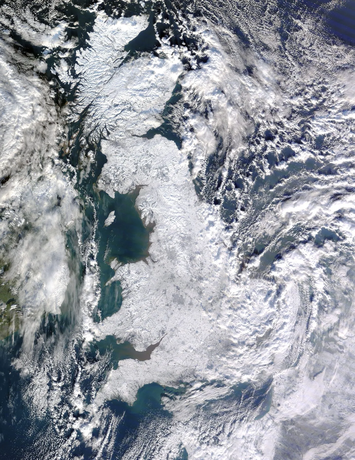 Satellite view of Great Britain almost entirely white with snow, 7 January 2010.