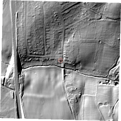 Shaded relief map of the ground around AL97UN, computed from Environment Agency LiDAR. The ground here sits at about 86 m above sea level and falls 33 m across the surrounding 800 m. Surface water reaching this point runs off ground lying to the north-east, 6.9 m higher.