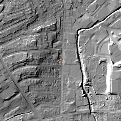 Shaded relief map of the ground around B113JS, computed from Environment Agency LiDAR. The ground here sits at about 112 m above sea level and falls 18 m across the surrounding 800 m. Surface water reaching this point runs off ground lying to the west-north-west, 14.8 m higher.