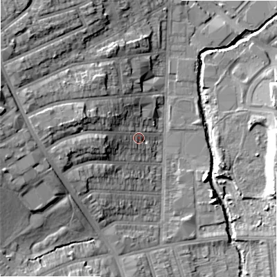 Shaded relief map of the ground around B113JY, computed from Environment Agency LiDAR. The ground here sits at about 116 m above sea level and falls 20 m across the surrounding 800 m. Surface water reaching this point runs off ground lying to the west, 11.6 m higher.