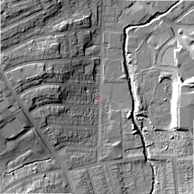 Shaded relief map of the ground around B113LB, computed from Environment Agency LiDAR. The ground here sits at about 113 m above sea level and falls 18 m across the surrounding 800 m. Surface water reaching this point runs off ground lying to the west, 14.5 m higher.
