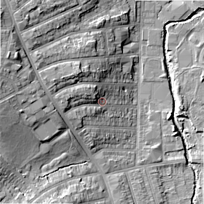 Shaded relief map of the ground around B113LD, computed from Environment Agency LiDAR. The ground here sits at about 119 m above sea level and falls 22 m across the surrounding 800 m. Surface water reaching this point runs off ground lying to the west, 7.1 m higher.