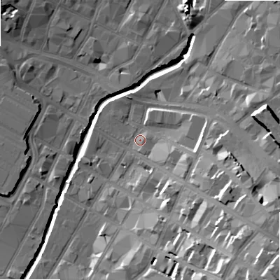 Shaded relief map of the ground around B120AJ, computed from Environment Agency LiDAR. The ground here sits at about 105 m above sea level and falls 33 m across the surrounding 800 m. Surface water reaching this point runs off ground lying to the south-east, 26.4 m higher.