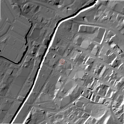 Shaded relief map of the ground around B120RP, computed from Environment Agency LiDAR. The ground here sits at about 105 m above sea level and falls 33 m across the surrounding 800 m. Surface water reaching this point runs off ground lying to the south-east, 21.1 m higher.