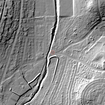 Shaded relief map of the ground around B138QT, computed from Environment Agency LiDAR. The ground here sits at about 119 m above sea level and falls 25 m across the surrounding 800 m. Surface water reaching this point runs off ground lying to the north-east, 23.5 m higher.