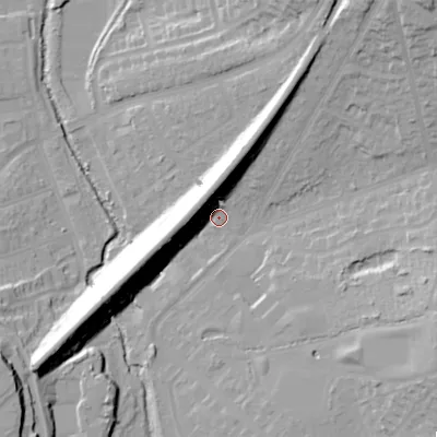 Shaded relief map of the ground around B146RR, computed from Environment Agency LiDAR. The ground here sits at about 131 m above sea level and falls 32 m across the surrounding 800 m. Surface water reaching this point runs off ground lying to the north, 14.9 m higher.