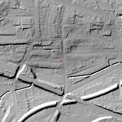 Shaded relief map of the ground around B210RE, computed from Environment Agency LiDAR. The ground here sits at about 130 m above sea level and falls 38 m across the surrounding 800 m. Surface water reaching this point runs off ground lying to the north-west, 24.1 m higher.