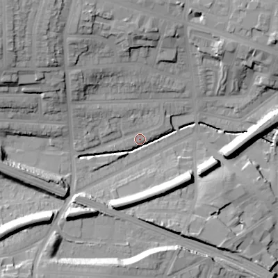 Shaded relief map of the ground around B210TH, computed from Environment Agency LiDAR. The ground here sits at about 125 m above sea level and falls 33 m across the surrounding 800 m. Surface water reaching this point runs off ground lying to the north-west, 31.7 m higher.