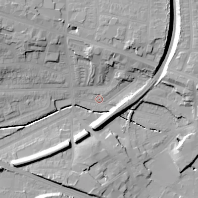 Shaded relief map of the ground around B210UP, computed from Environment Agency LiDAR. The ground here sits at about 121 m above sea level and falls 27 m across the surrounding 800 m. Surface water reaching this point runs off ground lying to the south-west, 19.3 m higher.