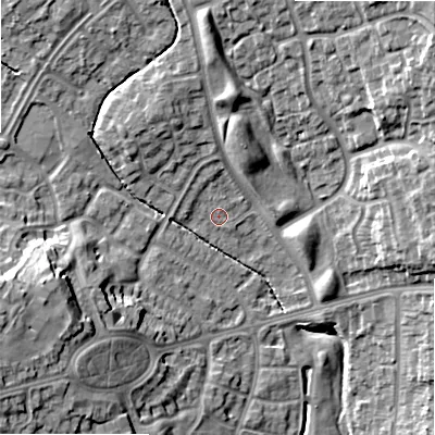 Shaded relief map of the ground around B235DN, computed from Environment Agency LiDAR. The ground here sits at about 112 m above sea level and falls 18 m across the surrounding 800 m. Surface water reaching this point runs off ground lying to the north, 2.8 m higher.