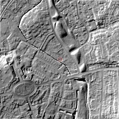 Shaded relief map of the ground around B235DW, computed from Environment Agency LiDAR. The ground here sits at about 111 m above sea level and falls 19 m across the surrounding 800 m. Surface water reaching this point runs off ground lying to the north-north-west, 4.5 m higher.