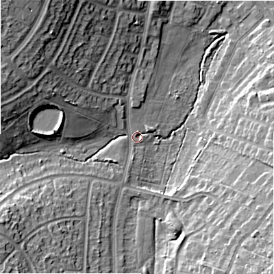 Shaded relief map of the ground around B277AG, computed from Environment Agency LiDAR. The ground here sits at about 115 m above sea level and falls 23 m across the surrounding 800 m. Surface water reaching this point runs off ground lying to the west-north-west, 16.3 m higher.