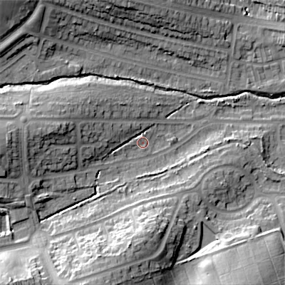 Shaded relief map of the ground around B295SP, computed from Environment Agency LiDAR. The ground here sits at about 136 m above sea level and falls 28 m across the surrounding 800 m. Surface water reaching this point runs off ground lying to the west, 12.0 m higher.