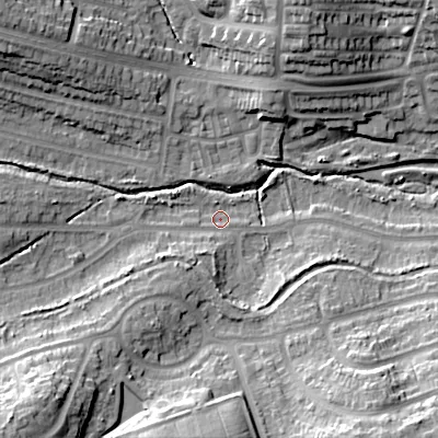 Shaded relief map of the ground around B296TA, computed from Environment Agency LiDAR. The ground here sits at about 134 m above sea level and falls 27 m across the surrounding 800 m. Surface water reaching this point runs off ground lying to the south-west, 17.7 m higher.