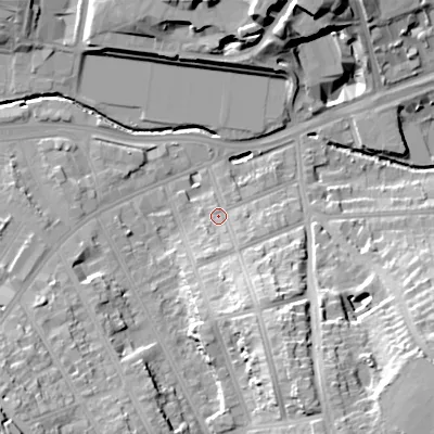Shaded relief map of the ground around B297DU, computed from Environment Agency LiDAR. The ground here sits at about 124 m above sea level and falls 28 m across the surrounding 800 m. Surface water reaching this point runs off ground lying to the south-south-east, 16.6 m higher.