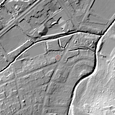 Shaded relief map of the ground around B297EL, computed from Environment Agency LiDAR. The ground here sits at about 115 m above sea level and falls 24 m across the surrounding 800 m. Surface water reaching this point runs off ground lying to the south-west, 9.6 m higher.
