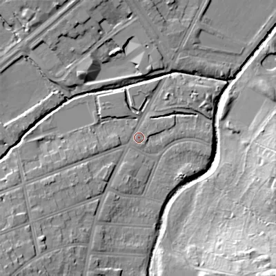 Shaded relief map of the ground around B297EN, computed from Environment Agency LiDAR. The ground here sits at about 115 m above sea level and falls 28 m across the surrounding 800 m. Surface water reaching this point runs off ground lying to the south-west, 9.0 m higher.