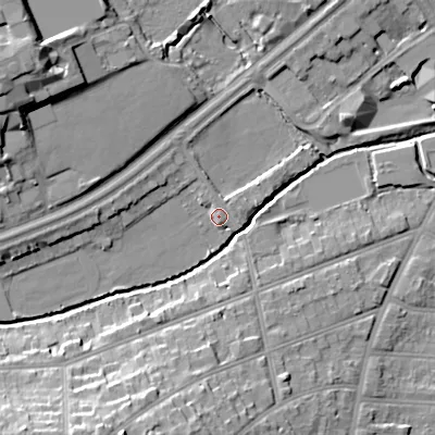 Shaded relief map of the ground around B297JX, computed from Environment Agency LiDAR. The ground here sits at about 118 m above sea level and falls 20 m across the surrounding 800 m. Surface water reaching this point runs off ground lying to the west, 6.8 m higher.