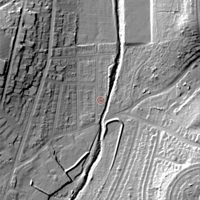 Shaded relief map of the ground around B297QQ, computed from Environment Agency LiDAR. The ground here sits at about 118 m above sea level and falls 25 m across the surrounding 800 m. Surface water reaching this point runs off ground lying to the south, 0.9 m higher.