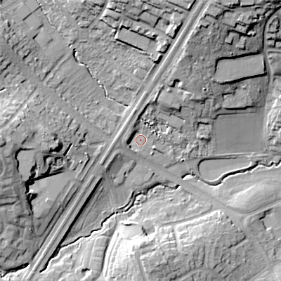 Shaded relief map of the ground around B301QY, computed from Environment Agency LiDAR. The ground here sits at about 136 m above sea level and falls 30 m across the surrounding 800 m. Surface water reaching this point runs off ground lying to the west, 3.5 m higher.