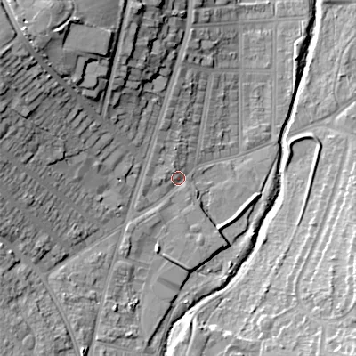 Shaded relief map of the ground around B302XN, computed from Environment Agency LiDAR. The ground here sits at about 121 m above sea level and falls 26 m across the surrounding 800 m. Surface water reaching this point runs off ground lying to the north-west, 20.8 m higher.