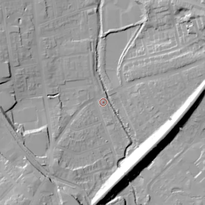 Shaded relief map of the ground around B303BT, computed from Environment Agency LiDAR. The ground here sits at about 127 m above sea level and falls 27 m across the surrounding 800 m. Surface water reaching this point runs off ground lying to the south, 21.8 m higher.