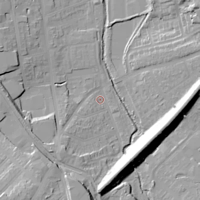 Shaded relief map of the ground around B303BX, computed from Environment Agency LiDAR. The ground here sits at about 127 m above sea level and falls 30 m across the surrounding 800 m. Surface water reaching this point runs off ground lying to the south, 20.1 m higher.