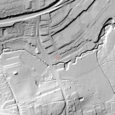 Shaded relief map of the ground around B303EP, computed from Environment Agency LiDAR. The ground here sits at about 136 m above sea level and falls 33 m across the surrounding 800 m. Surface water reaching this point runs off ground lying to the north, 18.6 m higher.