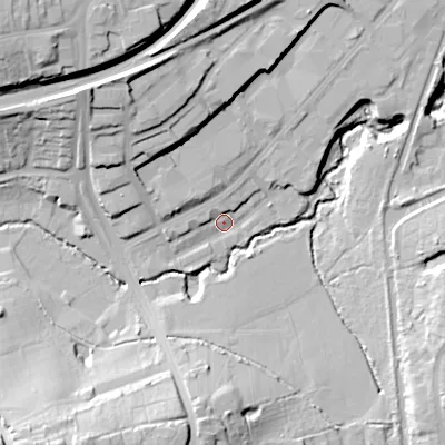 Shaded relief map of the ground around B303HB, computed from Environment Agency LiDAR. The ground here sits at about 135 m above sea level and falls 32 m across the surrounding 800 m. Surface water reaching this point runs off ground lying to the north-north-west, 19.8 m higher.