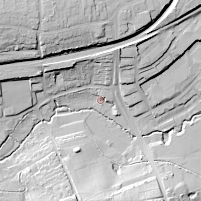 Shaded relief map of the ground around B303JX, computed from Environment Agency LiDAR. The ground here sits at about 136 m above sea level and falls 34 m across the surrounding 800 m. Surface water reaching this point runs off ground lying to the north-north-east, 7.0 m higher.