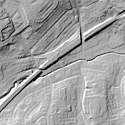 Shaded relief map of the ground around B313TE, computed from Environment Agency LiDAR. The ground here sits at about 150 m above sea level and falls 33 m across the surrounding 800 m. Surface water reaching this point runs off ground lying to the west, 9.9 m higher.