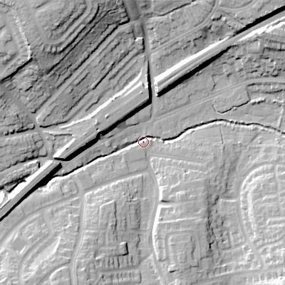 Shaded relief map of the ground around B313TG, computed from Environment Agency LiDAR. The ground here sits at about 148 m above sea level and falls 30 m across the surrounding 800 m. Surface water reaching this point runs off ground lying to the north-west, 28.3 m higher.