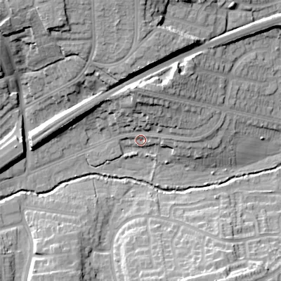 Shaded relief map of the ground around B313UW, computed from Environment Agency LiDAR. The ground here sits at about 148 m above sea level and falls 27 m across the surrounding 800 m. Surface water reaching this point runs off ground lying to the north, 15.1 m higher.
