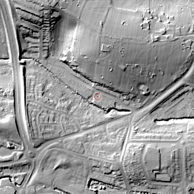 Shaded relief map of the ground around B322UU, computed from Environment Agency LiDAR. The ground here sits at about 145 m above sea level and falls 33 m across the surrounding 800 m. Surface water reaching this point runs off ground lying to the north-north-west, 26.0 m higher.