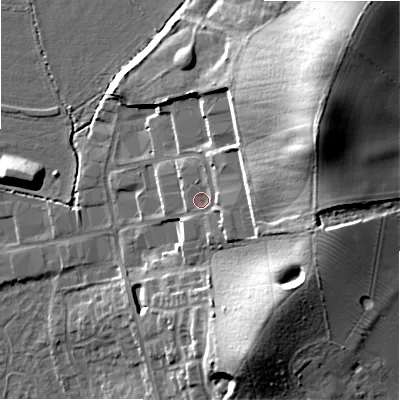 Shaded relief map of the ground around B496ES, computed from Environment Agency LiDAR. The ground here sits at about 52 m above sea level and falls 30 m across the surrounding 800 m. Surface water reaching this point runs off ground lying to the east, 2.9 m higher.