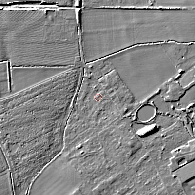Shaded relief map of the ground around B504AT, computed from Environment Agency LiDAR. The ground here sits at about 34 m above sea level and falls 9 m across the surrounding 800 m. Surface water reaching this point runs off ground lying to the east-north-east, 6.8 m higher.
