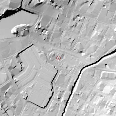 Shaded relief map of the ground around B56DB, computed from Environment Agency LiDAR. The ground here sits at about 104 m above sea level and falls 33 m across the surrounding 800 m. Surface water reaching this point runs off ground lying to the west-north-west, 2.6 m higher.