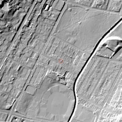 Shaded relief map of the ground around B57RA, computed from Environment Agency LiDAR. The ground here sits at about 111 m above sea level and falls 28 m across the surrounding 800 m. Surface water reaching this point runs off ground lying to the south-west, 2.4 m higher.