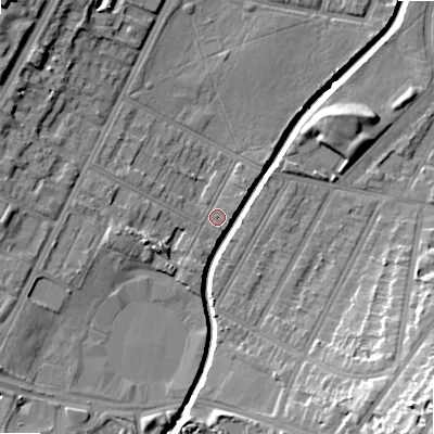 Shaded relief map of the ground around B57RB, computed from Environment Agency LiDAR. The ground here sits at about 110 m above sea level and falls 22 m across the surrounding 800 m. Surface water reaching this point runs off ground lying to the west, 3.9 m higher.
