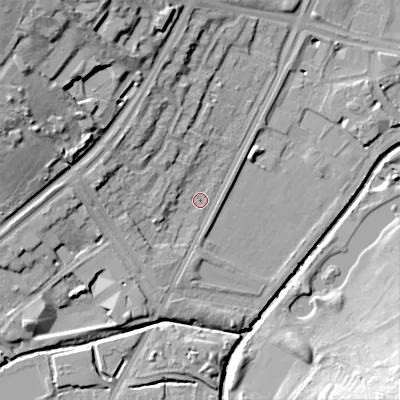 Shaded relief map of the ground around B57RZ, computed from Environment Agency LiDAR. The ground here sits at about 115 m above sea level and falls 29 m across the surrounding 800 m. Surface water reaching this point runs off ground lying to the west, 7.7 m higher.