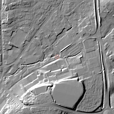 Shaded relief map of the ground around B601AX, computed from Environment Agency LiDAR. The ground here sits at about 94 m above sea level and falls 21 m across the surrounding 800 m. Surface water reaching this point runs off ground lying to the south, 13.6 m higher.