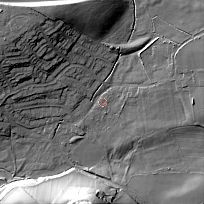 Shaded relief map of the ground around B601JL, computed from Environment Agency LiDAR. The ground here sits at about 122 m above sea level and falls 41 m across the surrounding 800 m. Surface water reaching this point runs off ground lying to the north-north-west, 23.3 m higher.