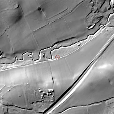 Shaded relief map of the ground around B604EX, computed from Environment Agency LiDAR. The ground here sits at about 64 m above sea level and falls 25 m across the surrounding 800 m. Surface water reaching this point runs off ground lying to the south, 14.7 m higher.