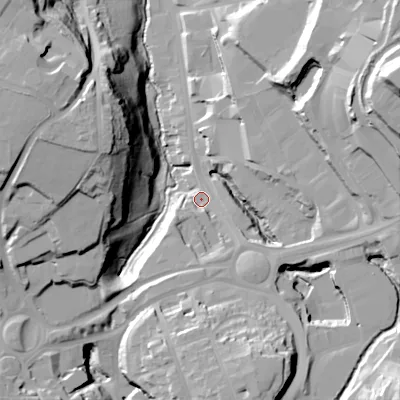 Shaded relief map of the ground around B633LS, computed from Environment Agency LiDAR. The ground here sits at about 110 m above sea level and falls 51 m across the surrounding 800 m. Surface water reaching this point runs off ground lying to the south-south-west, 12.1 m higher.
