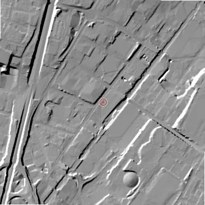 Shaded relief map of the ground around B64AE, computed from Environment Agency LiDAR. The ground here sits at about 100 m above sea level and falls 21 m across the surrounding 800 m. Surface water reaching this point runs off ground lying to the south-west, 14.3 m higher.
