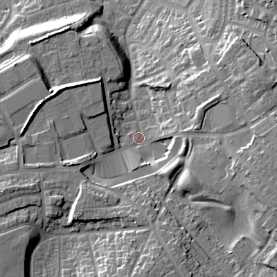 Shaded relief map of the ground around B711AS, computed from Environment Agency LiDAR. The ground here sits at about 134 m above sea level and falls 23 m across the surrounding 800 m. Surface water reaching this point runs off ground lying to the east-south-east, 14.9 m higher.