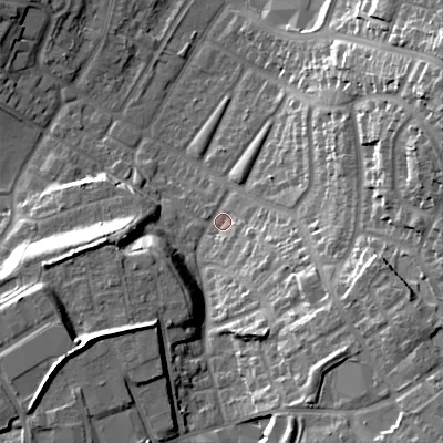 Shaded relief map of the ground around B711AZ, computed from Environment Agency LiDAR. The ground here sits at about 127 m above sea level and falls 26 m across the surrounding 800 m. Surface water reaching this point runs off ground lying to the south-east, 21.6 m higher.