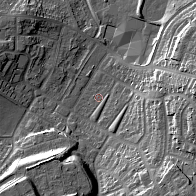 Shaded relief map of the ground around B711JD, computed from Environment Agency LiDAR. The ground here sits at about 124 m above sea level and falls 25 m across the surrounding 800 m. Surface water reaching this point runs off ground lying to the south-south-east, 2.4 m higher.