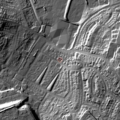 Shaded relief map of the ground around B711JE, computed from Environment Agency LiDAR. The ground here sits at about 125 m above sea level and falls 32 m across the surrounding 800 m. Surface water reaching this point runs off ground lying to the east-south-east, 27.2 m higher.