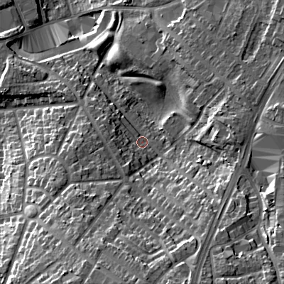 Shaded relief map of the ground around B711QH, computed from Environment Agency LiDAR. The ground here sits at about 142 m above sea level and falls 27 m across the surrounding 800 m. Surface water reaching this point runs off ground lying to the south-south-east, 19.6 m higher.
